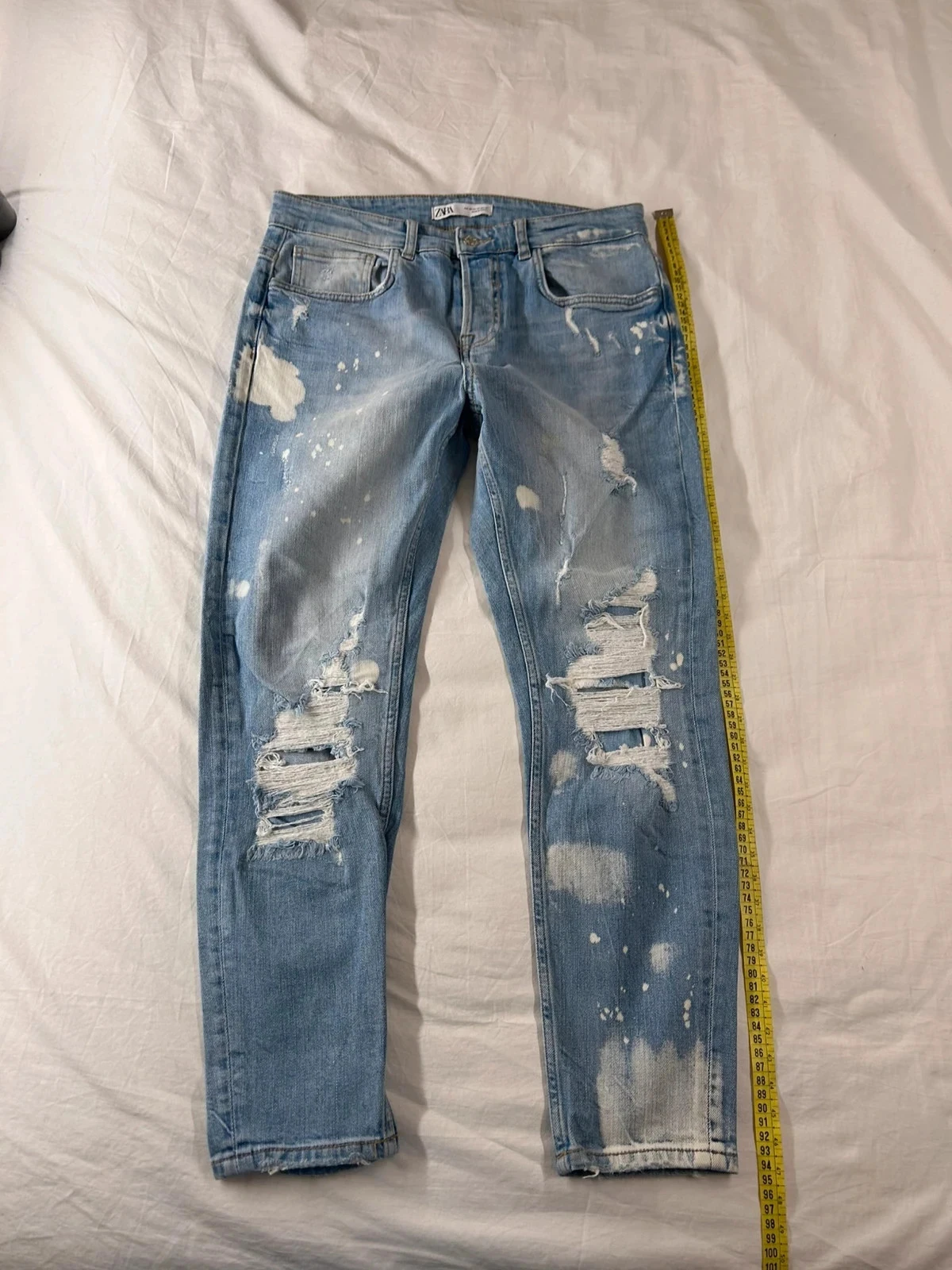 Jean troué bleu clair zara